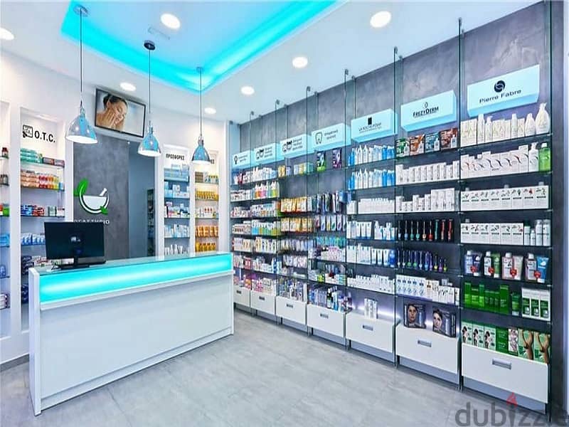 A pharmacy for sale serving 114 clinics in installments over 7 years on a main square in the New Administrative Capital 14