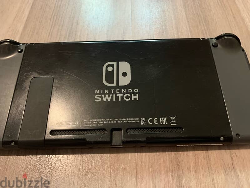 Bundle: Nintendo Switch + Travel Case + Pro Controller + 1 game 1
