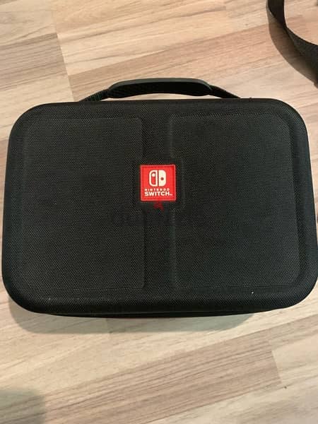 Bundle: Nintendo Switch + Travel Case + Pro Controller + 1 game 5