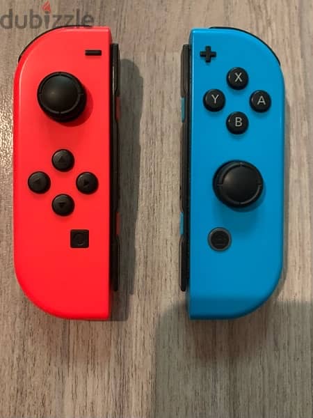 Bundle: Nintendo Switch + Travel Case + Pro Controller + 1 game 8
