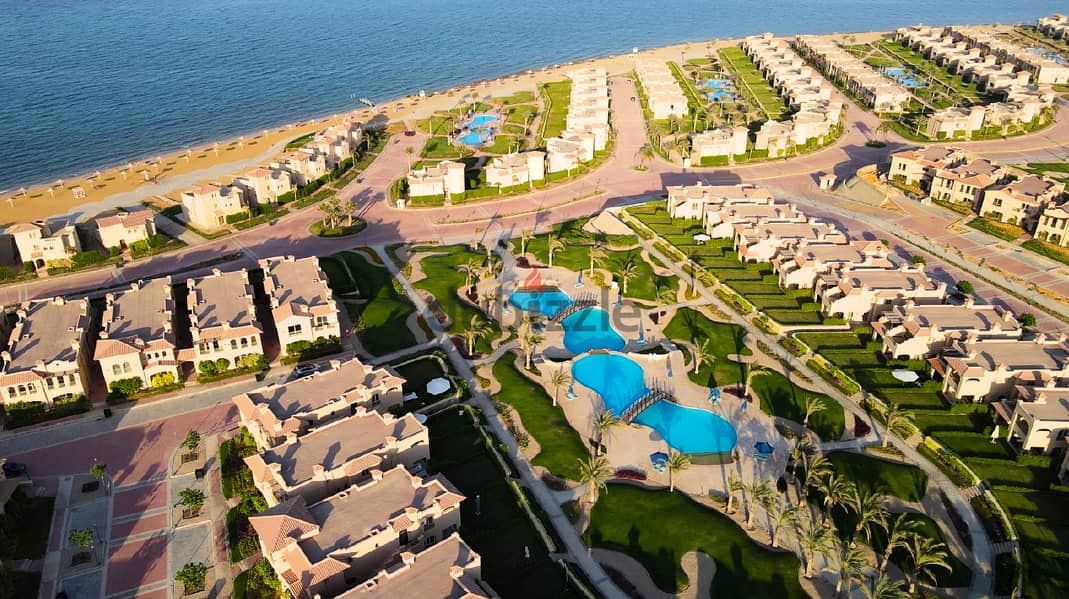With a 5% down payment, receive a fully finished chalet, first row on the sea, in La Vista Gardens, Ain Sokhna, next to Porto Sokhna, Lavista Gardens 2