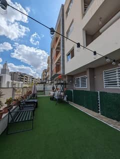 Apartment for sale in Regency Sheikh Zayed Compound - Ground with garden 162M