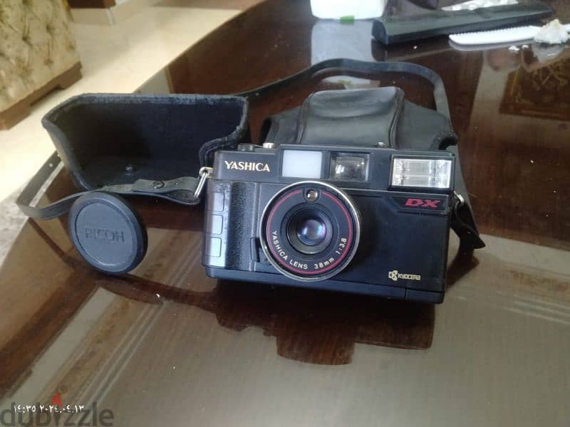 كاميرا yashica . ياباني اصلي من النوادر بحالتها كامله بمشتملاتها 5