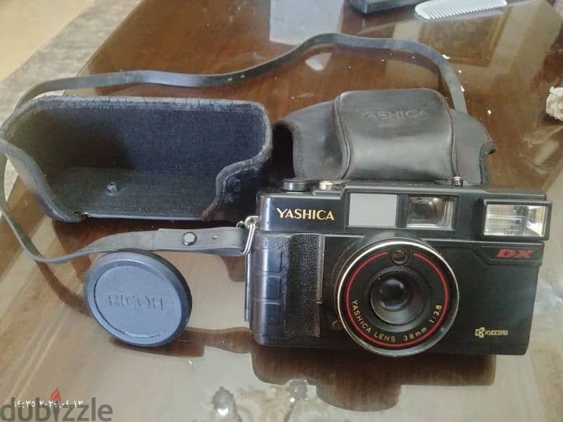 كاميرا yashica . ياباني اصلي من النوادر بحالتها كامله بمشتملاتها 6