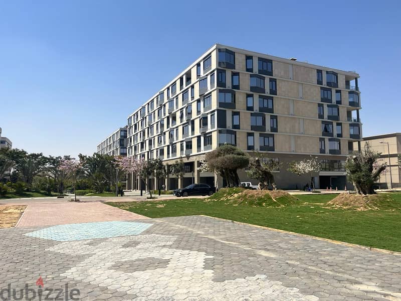Immediate delivery of a 114 sqm office (finished) for sale in the largest administrative building in the heart of Sheikh Zaid in Sodic West, in instal 0