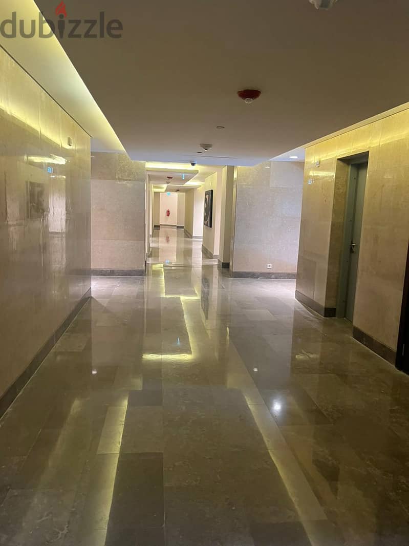 Immediate delivery of a 114 sqm office (finished) for sale in the largest administrative building in the heart of Sheikh Zaid in Sodic West, in instal 1