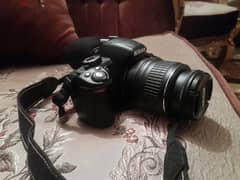 Camera Nikon d3100 مع عدسه نيكون 18-55 وشاحن