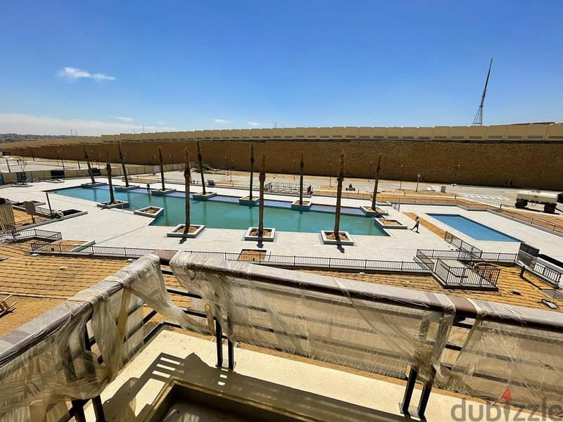 Fully Finished with Pool View Apartment for Sale in The Fourteen Uptown Cairo 5