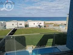 A chalet with high-end finishes directly on the sea in the best project in Ras El Hekma, John Sodic, on the most beautiful sea on the North Coast. 0