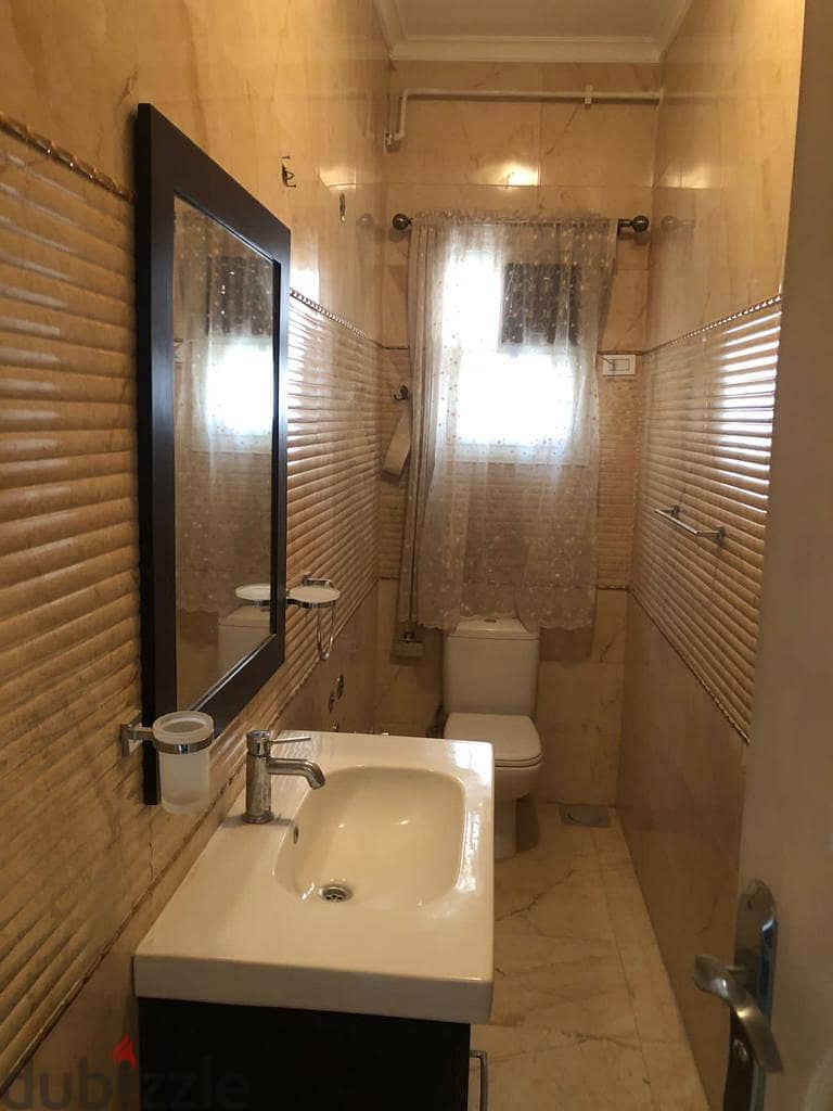 Apartment for rent in South Academy, view on Cairo Festival City, semi furnished, with kitchen and air conditioners, PRIME location 4