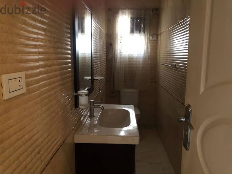 Apartment for rent in South Academy, view on Cairo Festival City, semi furnished, with kitchen and air conditioners, PRIME location 5