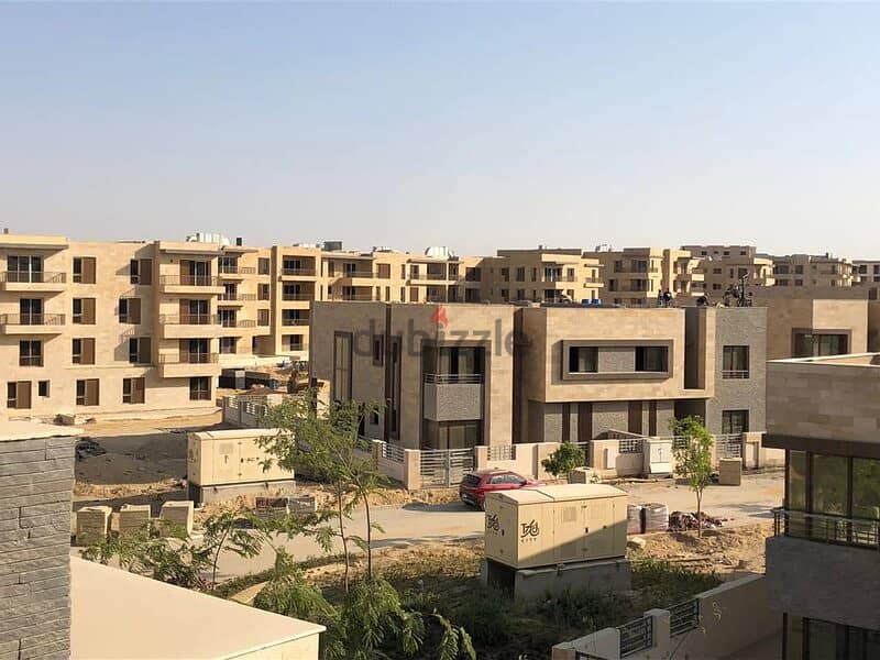 For sale, 156 sqm apartment in front of the airport with a view garden in Taj City, New Cairo, in installments over 8 years 8