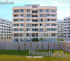 130 meter apartment for sale in front of Madinaty in the heart of Fifth Settlement in Bloom Fields with payment facilities over 9 years